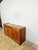 This offer features an exceptional modernist sideboard of Danish origin, crafted by the renowned manufacturer Dyrlund and...