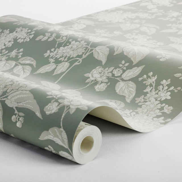 A romantic revival of a 1920s design from the Boråstapeter archive, Syren features a graceful repeat of stylized lilac...