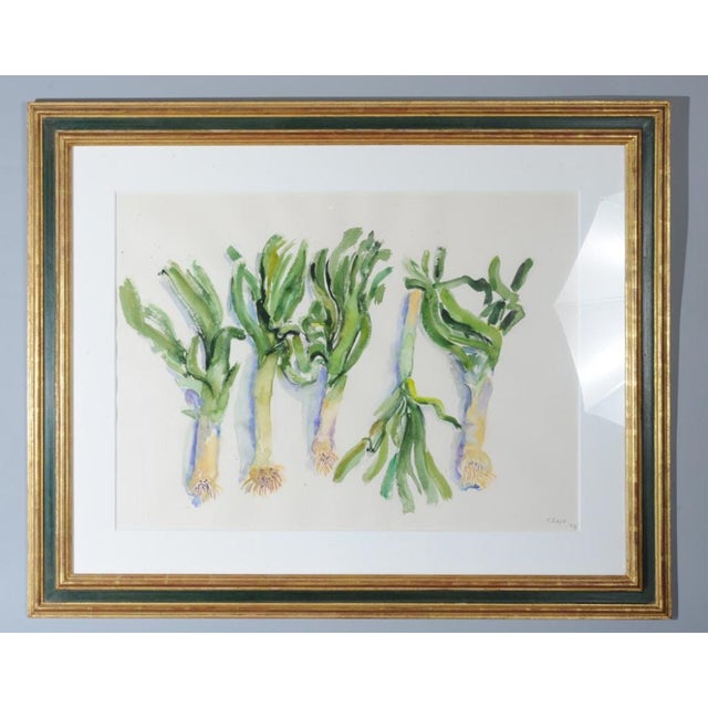 Hand signed and dated leeks on a kitchen table 31.5 X 39.5 framed. 21 X 28.5 sheet without frame. Bernard Chaet (born...