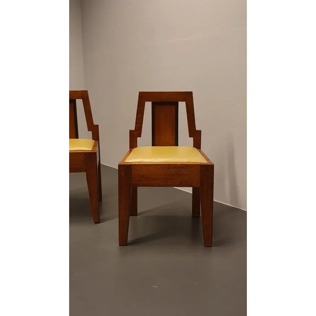 Pair of 1930s Art Deco Chairs from the Netherlands in solid wood frame with faux leather (removable) upholstered seats....