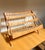 A beautiful vintage 1950s birch wood Magazine Rack by Pic-a-Pipe Detroit MI, with the original sticker label on back. This...