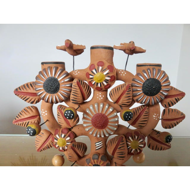 Mexican terracotta "tree of life" candlestick/candlestick. 1970s. Typical Mexican handcrafted sculpture with flowers,...