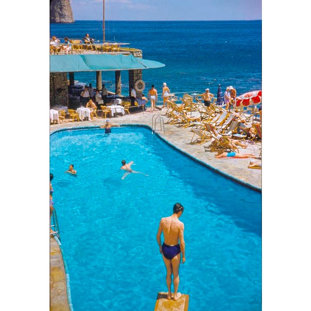 A Pool In Capri by Toni Frissell Bathers at a beachside swimming pool, Capri, Italy, 1959. (Photo by Toni Frissell) 20x16"...