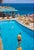 A Pool In Capri by Toni Frissell Bathers at a beachside swimming pool, Capri, Italy, 1959. (Photo by Toni Frissell) 20x16"...