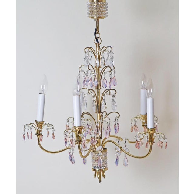 This beautiful chandelier with precious colored crystals is a wonderful creation by the manufacturer palwa. We chose very...