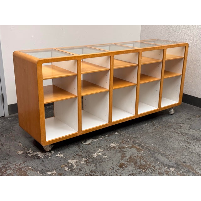 Design Plus Gallery presents a Bespoke Retail Display Case on Casters. This retired Baby GAP classic fixture dates to...
