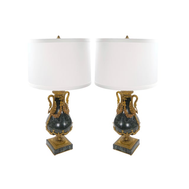 A handsome pair of Italian 19th-century Louis XVI style urn-form lamps, executed in richly variegated green Verde Antico...