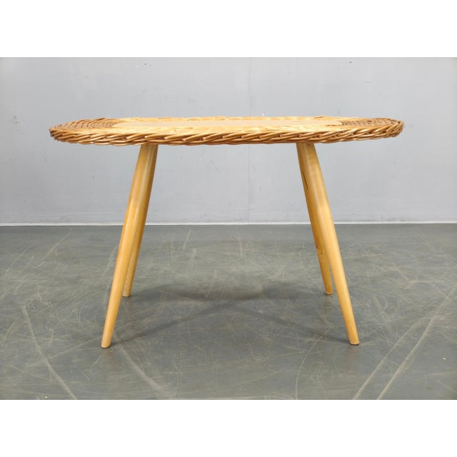 Elegant coffee table designed by Jan Kalous and produced by ULUV in Czechoslovakia in the 1970s. The piece combines a...