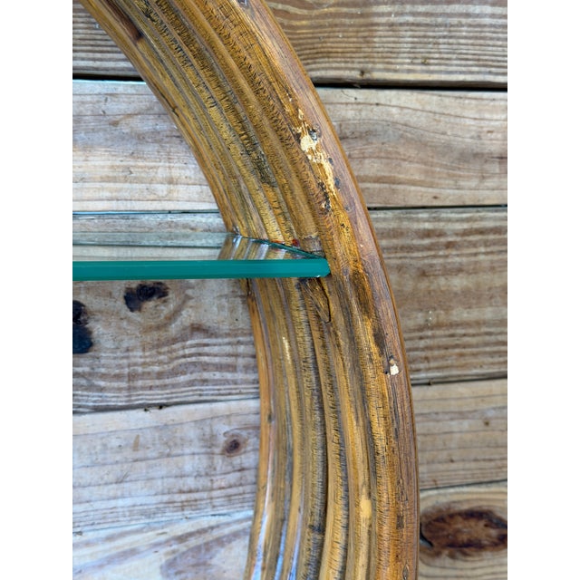 Monumental vintage bent seven strand rattan circular wall shelf featuring dramatic oversized scale and clean organic...