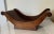 Mahogany cheese sleigh. Originally intended to hold large rounds of cheese, these trays now are used as centerpieces on...
