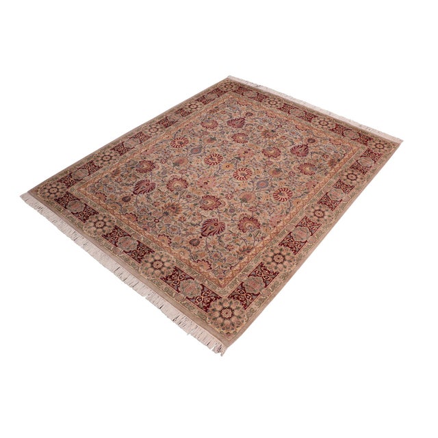 Designed with mesmerizing intricacy and gorgeous color palette, this hand-knotted masterpiece demonstrates the beauty and...