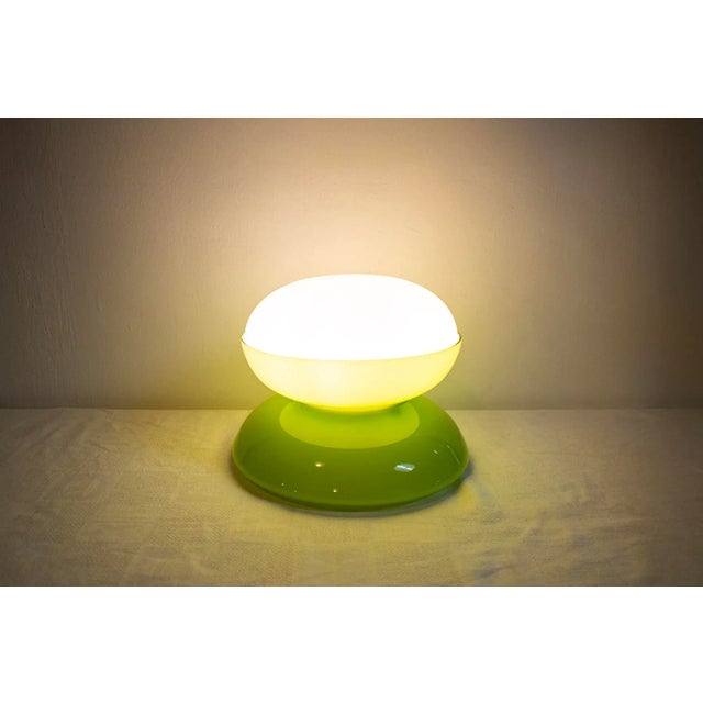 Table lamp in milky green cased glass and opaline glass. Manufacturer Selenova 1970s I have official proof of authenticity...