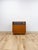 This practical and beautifully crafted vintage MCM teak rolling TV stand and cart is a versatile and good-looking Danish...