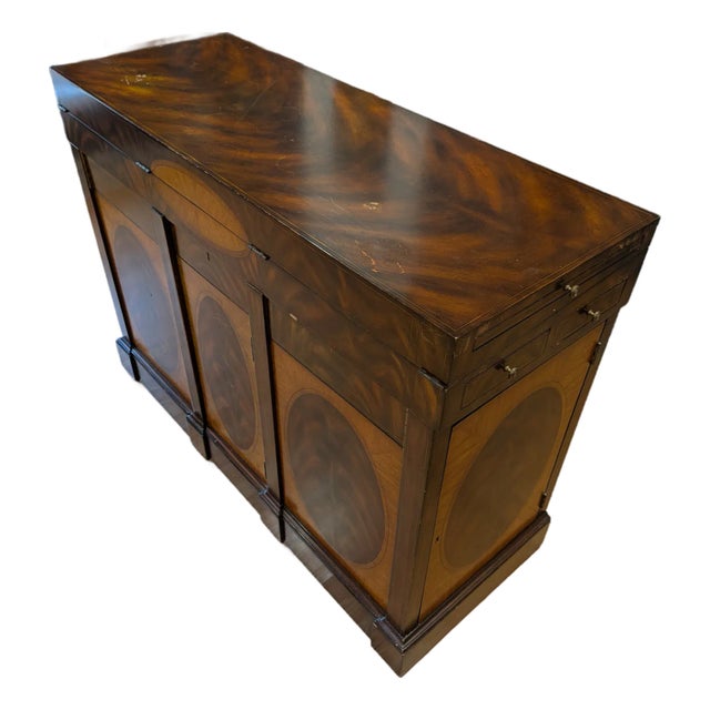 Exceptional Maitland-Smith architect’s / cartography desk, handmade in the Philippines. Rich mahogany construction with...