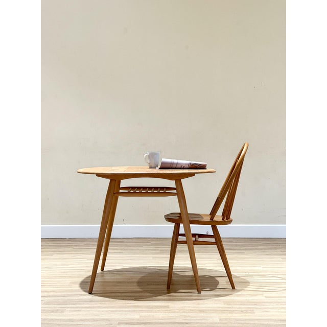 This exceptional table, designed by Lucian Ercolani in England during the 1960s, showcases the craftsmanship of the era....