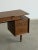 W49 D18 H29.25 Knee Clearance 24.5 KW16 Authentic vintage G-Plan desk by E. Gomme Ltd., made in England circa 1960s....
