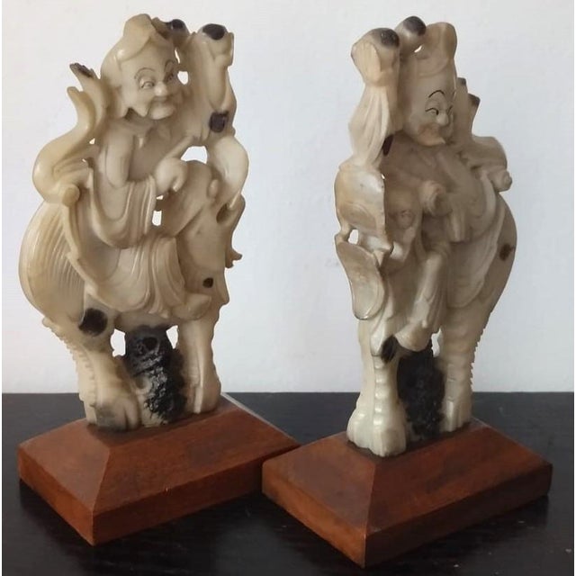 Pair of 19th Century Carved Stone Qilin Rider Sculptures on Wooden Bases. For Sale - Image 4 of 7