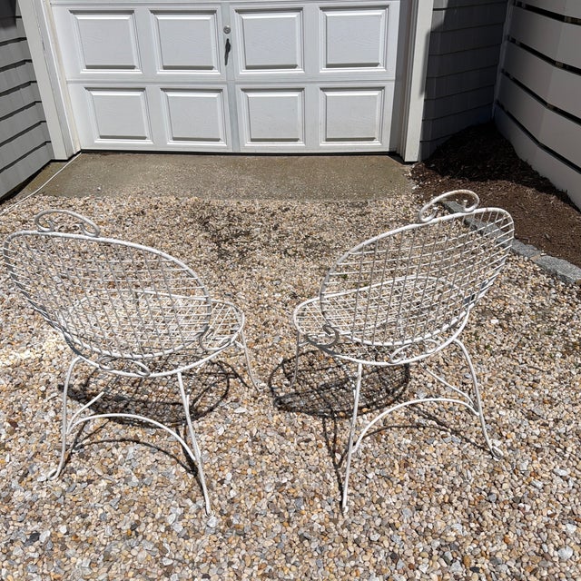 Beautiful ornate metal garden chairs set of 2. Painted white.