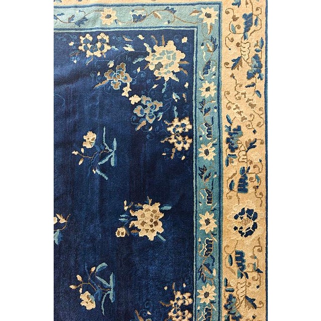 Antique Peking Chinese Allover Floral Blue 1920s Rug, Circa Date: 1920s. This magnificent example of early 20th-century...