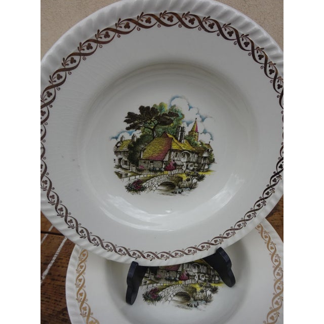 Set of 11 Lunéville earthenware soup plates. Made in Lorraine, France, between 1892 and 1923 by Keller & Guérin. Each...