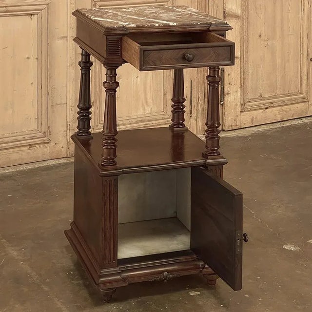 19th Century French Louis XVI Rosewood Marble Top Nightstand were crafted from what is considered the king of woods,...