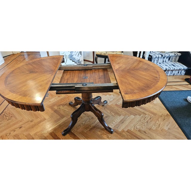 Mid 20th Century Mid-Century Round to Oval Walnut Extendable Dining Table For Sale - Image 5 of 11