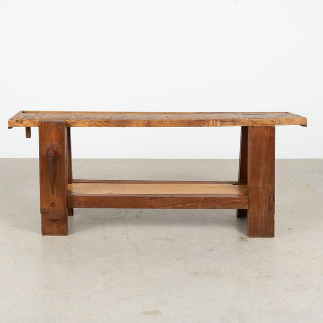 Late 19th century Portuguese carpenter's workbench, now well suited for use as a distinctive console or display table. The...