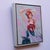 The artwork features a dynamic figure captured in a moment of expressive movement, embodying a sense of rhythm and...
