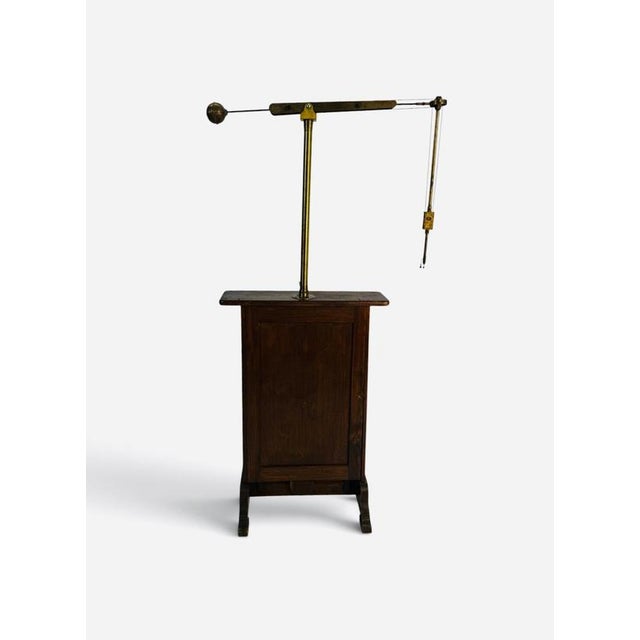 Rare late 19th-century dentist's milling machine, made in France from wood, brass and cast iron with a pedal system, in...