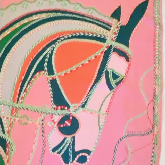 Iconic fashion accessory designed in the most desirable vibrant pinks and greens. Great addition to a discriminating...