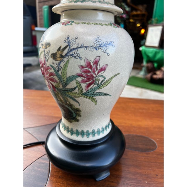 Up for consideration is a beautiful vintage hand painted floral table lamp with bird accents. This would look lovely in...