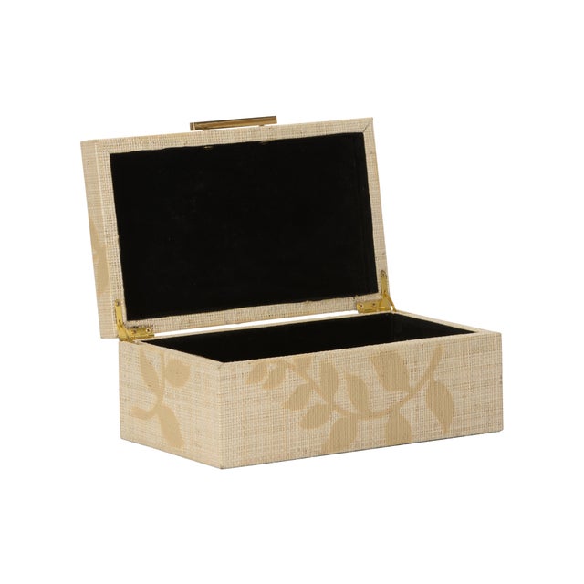 The Autumnal Small Box, crafted from wood and wrapped in natural raffia, features a charming leaf decal and finished with...
