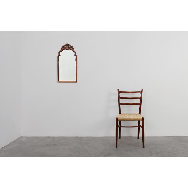 A refined Louis XV mirror from late‑19th‑century France, crafted in richly figured root veneer and shaped into an elegant...