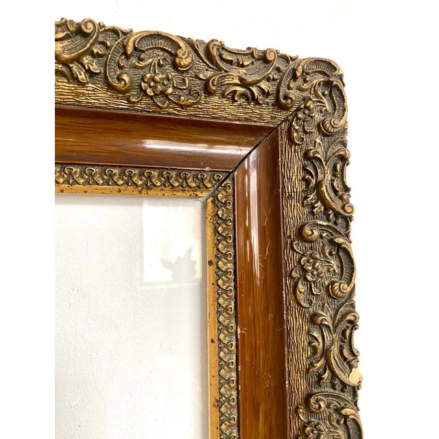 Carved wooden frame, floral. Art Nouveau style Good condition, patina of use, some gaps in the decor The glass is still...