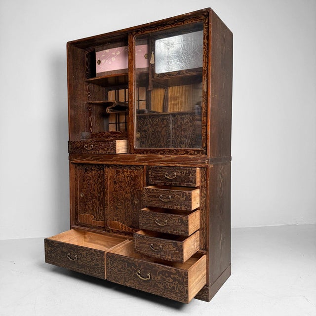 This beautiful Japanese tea cabinet, known as a chadansu (茶箪笥), is a refined and rare piece of furniture originally...