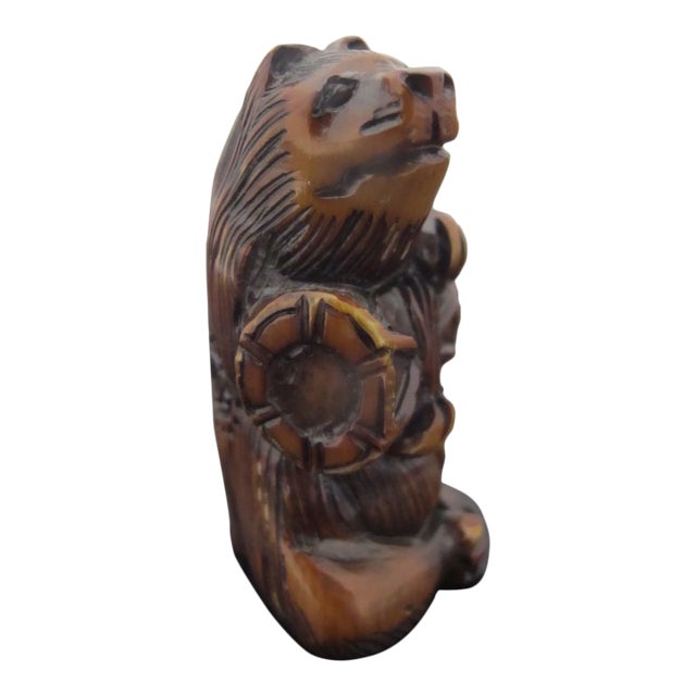 Antique Japanese Carved Wood Badger or Bear With Barrel Netsuke Figurine For Sale