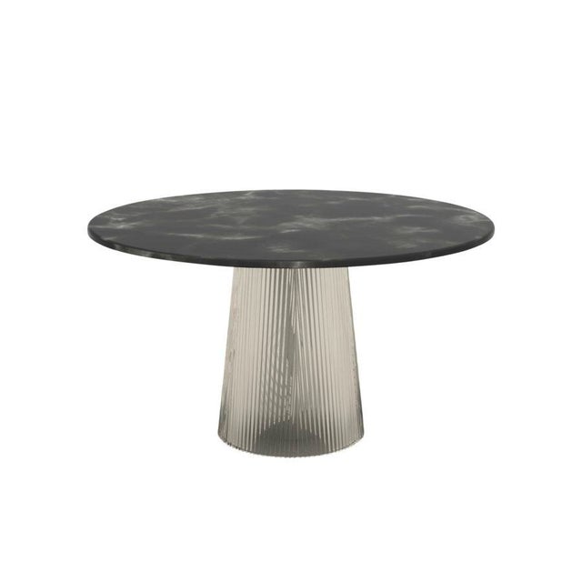 Two kinds of material united in one table. Sebastian Herkner’s fine, characteristically bent with its rippled visual has...