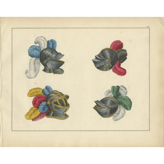 19th-Century Hand-Coloured Lithograph of Knightly Helmets with Vibrant Plumes : This striking hand-coloured lithograph...