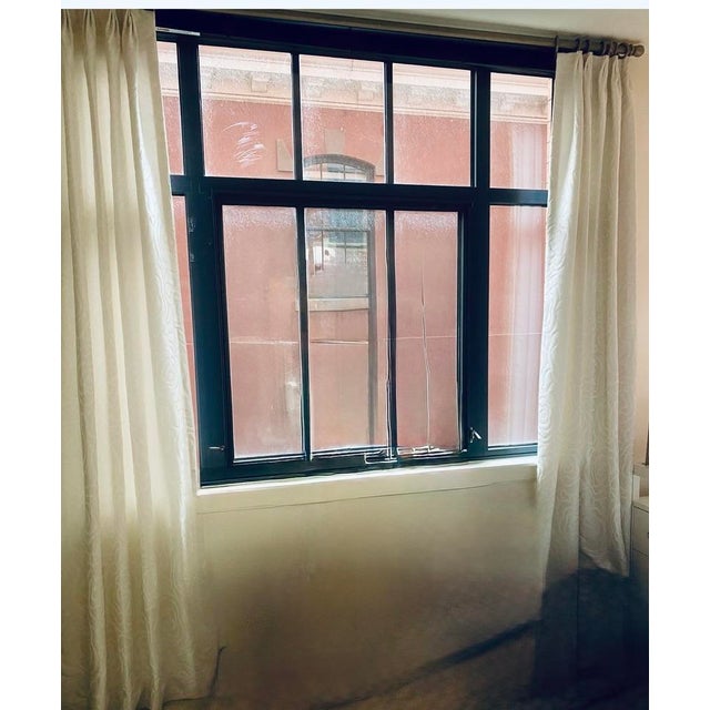 Elegant pair of Ethan Allen pinch-pleat drapery panels crafted from a luxurious linen and silk blend. The panels feature a...