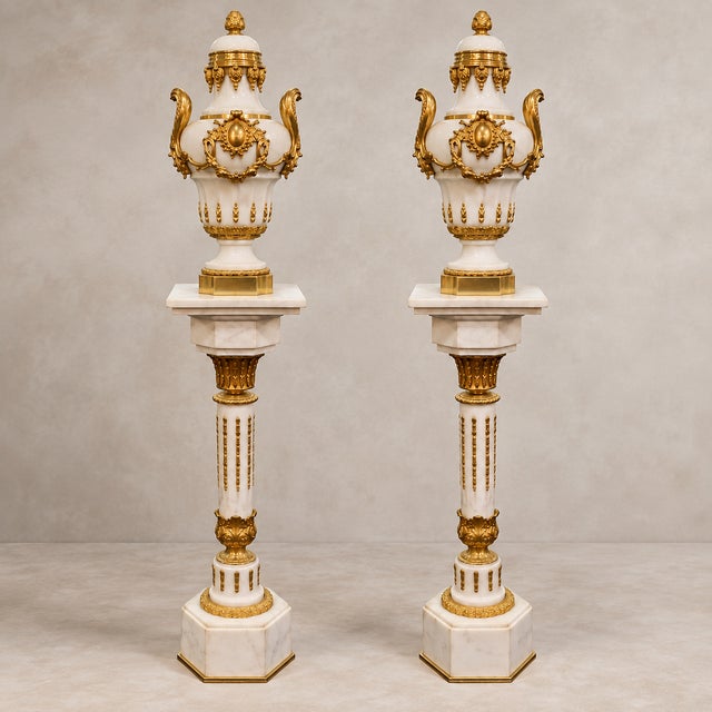 A striking French Empire-style pedestal combining luxurious materials and highly decorative craftsmanship. The base is...