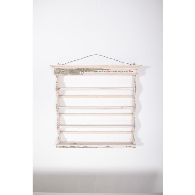This charming wall-mounted plate rack is a traditional Portuguese piece, commonly used in kitchens to display decorative...