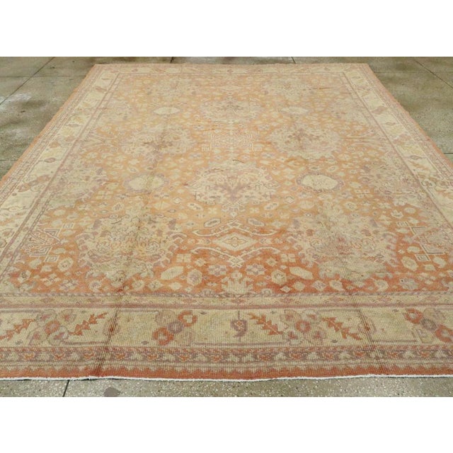 An antique Turkish Oushak Square room size carpet handmade during the Early 20th century. Measures: 9' 11" x 11' 11"