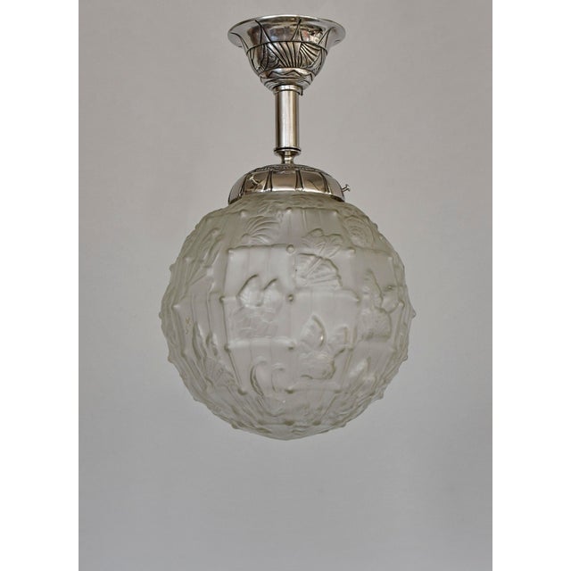 Ranc frères A wonderful 1925-1935 French art deco semi-flush mount ceiling fixture in nickeled bronze or solid brass. The...