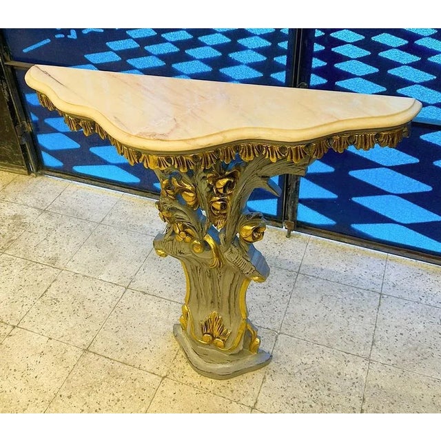 Gorgeous style and details. Beautiful large gray console with marble topped. This item has been fully refinished and a...