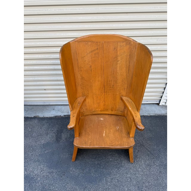 A striking handcrafted Warming Chair by noted California designer Richard Mulligan, Los Angeles. Mulligan’s work is...