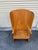 A striking handcrafted Warming Chair by noted California designer Richard Mulligan, Los Angeles. Mulligan’s work is...
