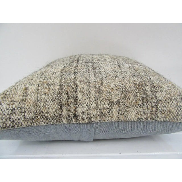 This is a pillow cover made from a vintage kilim rug. The piece was properly washed and ready to use. Pillow inserts not...