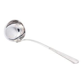 Smooth Silver Soup Ladle with Reliefs For Sale