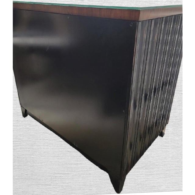 A wonderful extremely versatile dark brown fluted wood top storage buffet cabinet. This is a perfect piece for extra...