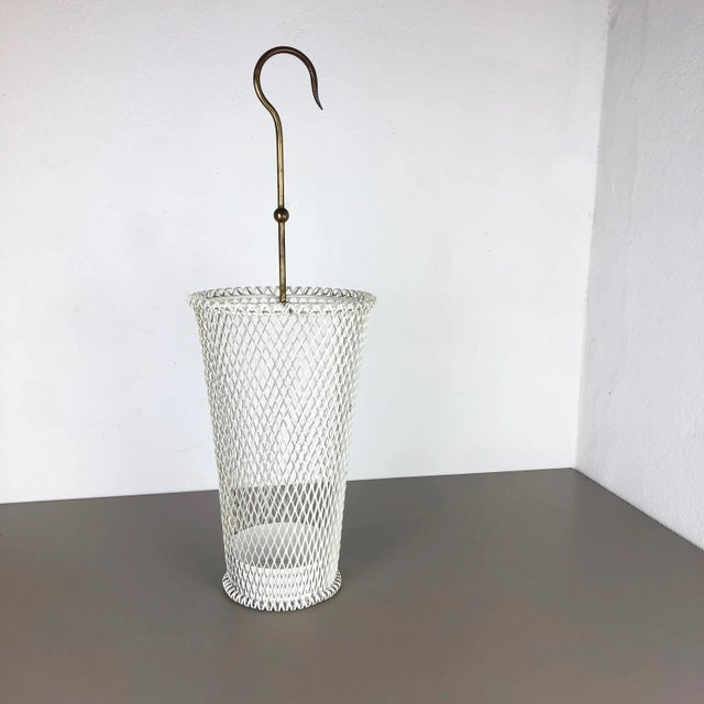 Umbrella stand in style of Matégot Origin: France Age: 1950s This original vintage umbrella stand was produced in the...